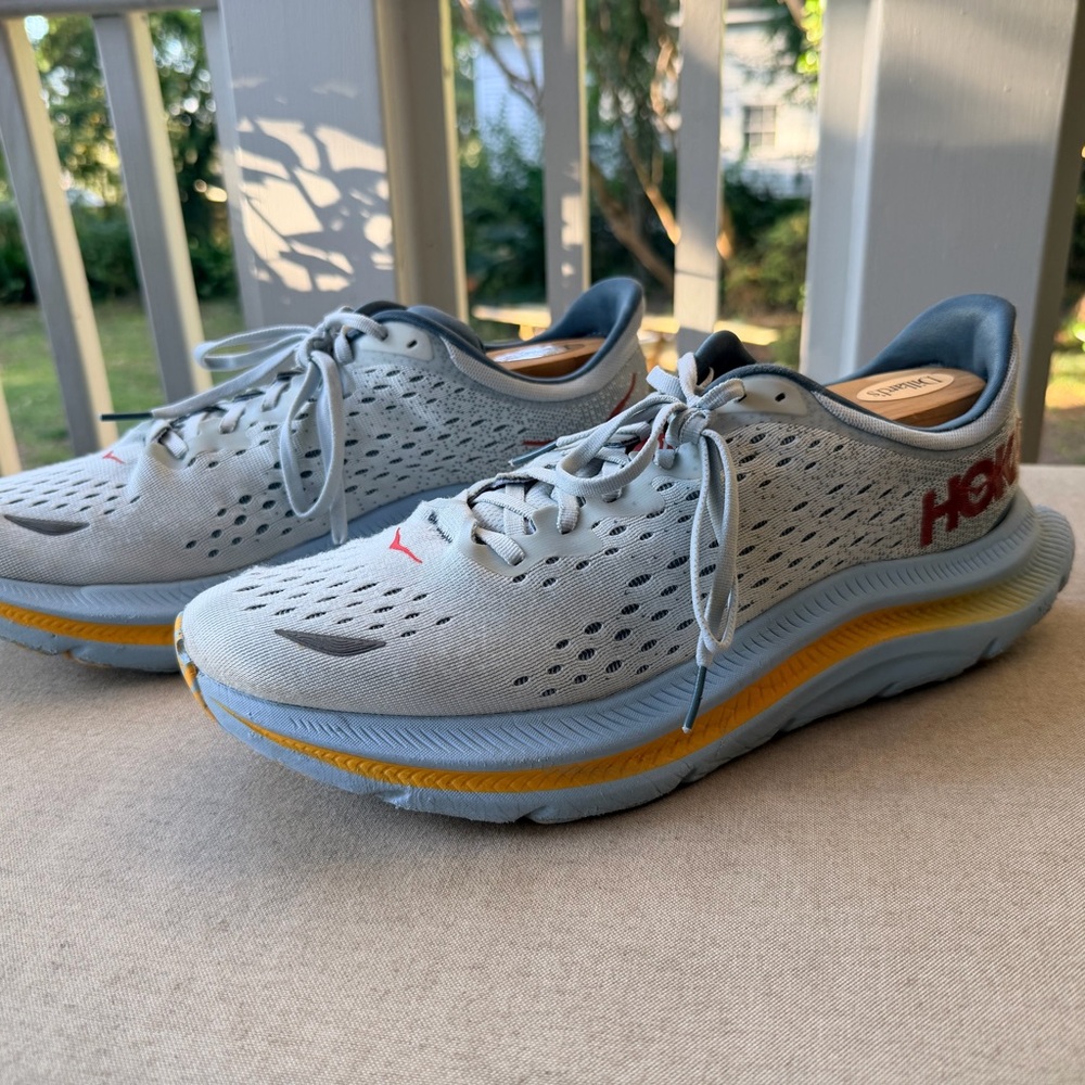 Hoka Men's Light Gray Running Shoes with Yellow & Red Accents